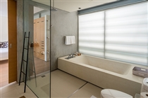 Ensuite bathroom with tub